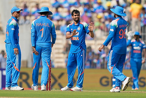 India's Prince Yadav, center, celebrates with teammates the wicket of Afghanistan's Azmatullah Omarzai during the third ODI cricket match between Afghanistan and India in Chennai.