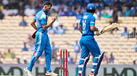 AP Photo/Mahesh Kumar A. : India's Prasidh Krishna, left, celebrates with teammates the wicket of Afghanistan's Rahmat Shah, right, during the third ODI cricket match between Afghanistan and India in Chennai, India, Saturday, June 20, 2026.