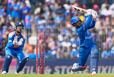 Afghanistan's Azmatullah Omarzai plays a shot during the third ODI cricket match between Afghanistan and India in Chennai.