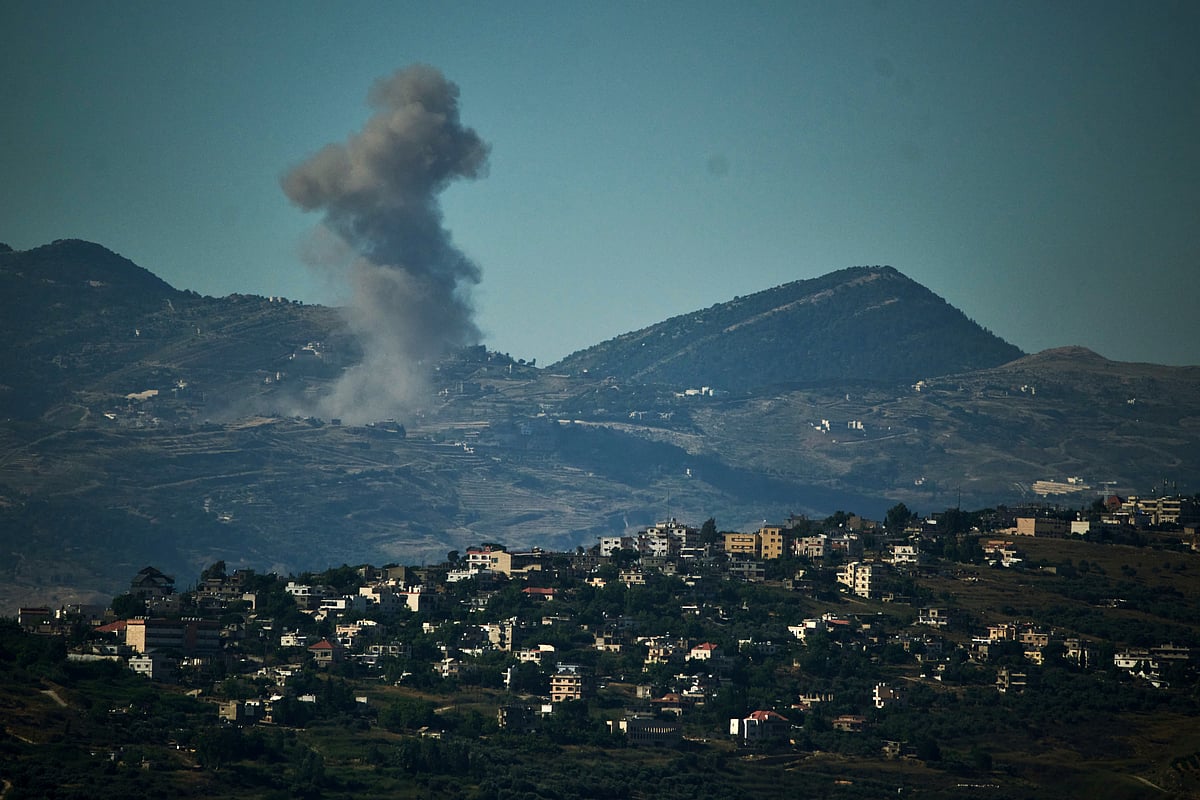 Smoke rises to the sky following an Israeli military strike in southern Lebanon as seen from northern Israel, Friday, June 19, 2026.  - (AP Photo/Leo Correa)