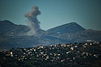 (AP Photo/Leo Correa) : Smoke rises to the sky following an Israeli military strike in southern Lebanon as seen from northern Israel, Friday, June 19, 2026. 