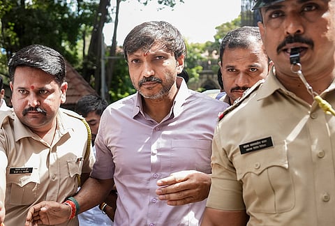 Shiv Sena (UBT) MP Omprakash Raje Nimbalkar arrives during a hearing in the murder case of his father and state Congress leader Pawanraje Nimbalkar and the latter's driver, in Mumbai. A special court on Saturday acquitted former Maharashtra home minister Padamsinh Patil and seven others in the 2006 murder case of Nimbalkar and his driver. 