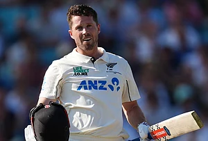 | Photo: Ben Whitley/PA via AP : New Zealand's Henry Nicholls celebrates reaching his century on day three of the second cricket test between England and New Zealand, in London.