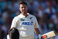 | Photo: Ben Whitley/PA via AP : New Zealand's Henry Nicholls celebrates reaching his century on day three of the second cricket test between England and New Zealand, in London. 