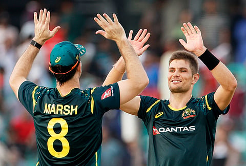 Australia's players celebrate after winning the second T20 international cricket match against Bangladesh, in Chattogram, Bangladesh.