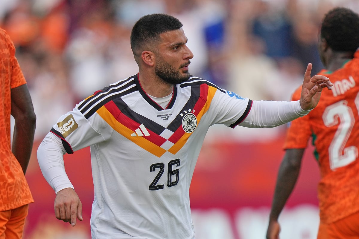Germany's Deniz Undav (26) celebrates after scoring their second goal during the World Cup Group E soccer match - AP