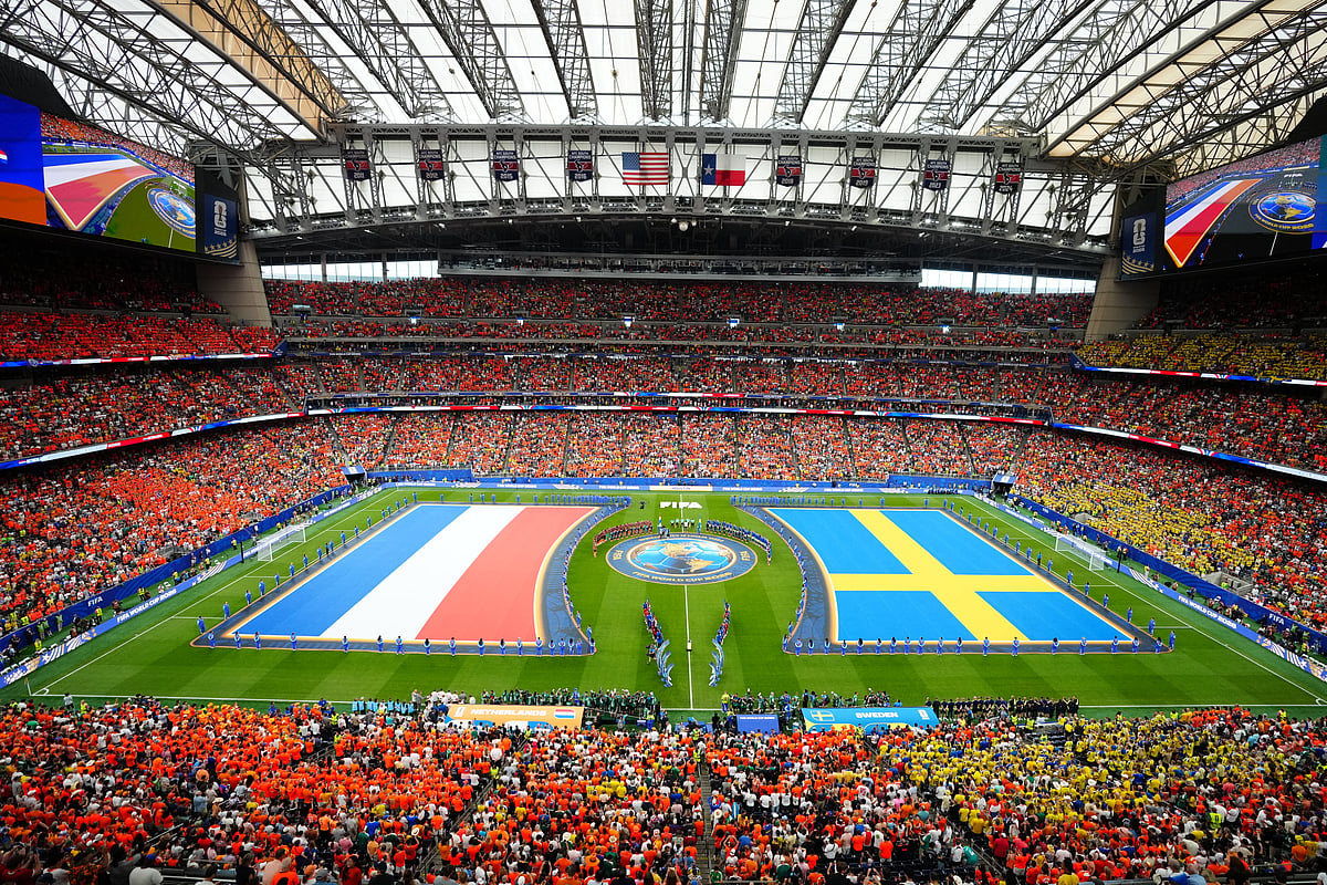 Teams line up on the pitch ahead of the World Cup Group F soccer match between the Netherlands and Sweden in Houston, Saturday - AP/Karen Warren