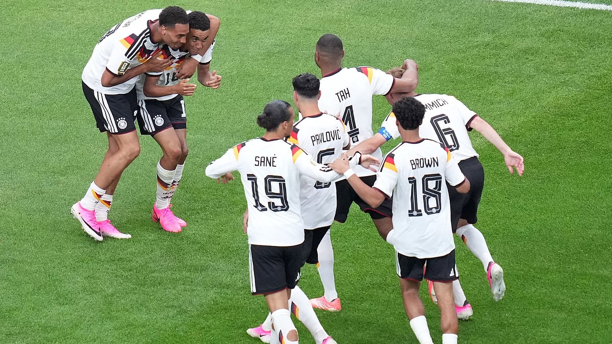Germany's Jamal Musiala (10), top right, celebrates after scoring his side's fourth goal during the World Cup Group E soccer match between Germany and Curacao in Houston, Sunday, June 14, 2026.  - (AP Photo/Eric Smith)
