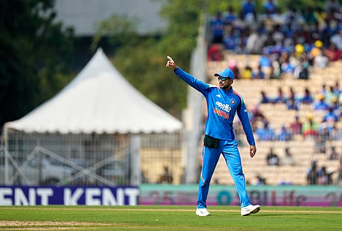 India's captain Shubman Gill sets the field during the third ODI cricket match between Afghanistan and India in Chennai.