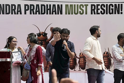 Cockroach Janta Party (CJP) founder Abhijeet Dipke during a protest over alleged examination irregularities, repeated paper leaks and demands for accountability from the government, in New Delhi.