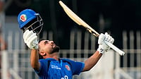 AP Photo/Mahesh Kumar A. : Afghanistan's captain Hashmatullah Shahidi celebrates his century during the third ODI cricket match between Afghanistan and India in Chennai, India, Saturday, June 20, 2026.