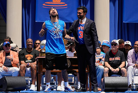 New York Knicks guard Jose Alvarado, left, celebrates with Mayor Zohran Mamdani during the New York Knicks' NBA championship parade in New York.