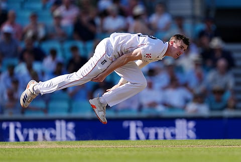 England's Harry Brook bowls on day three of the second cricket test between England and New Zealand, in London.
