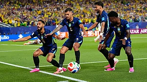 (AP Photo/Petr David Josek) : Brazil's Matheus Cunha (9) celebrates after scoring his side's opening goal with teammates during the World Cup Group C soccer match between Brazil and Haiti in Philadelphia, Friday, June 19, 2026