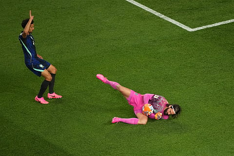 Brazil goalkeeper Alisson Becker, right, makes a save during the World Cup Group C soccer match between Brazil and Haiti in Philadelphia, Friday, June 19, 2026.