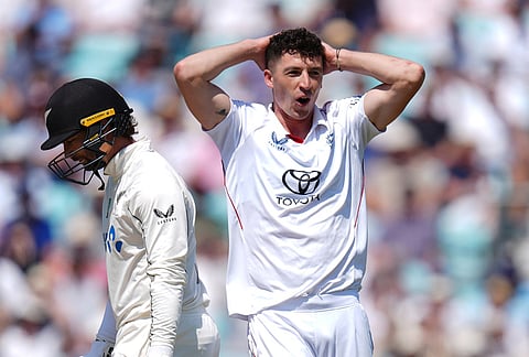 England's Matt Fisher reacts after a failed appeal on day three of the second cricket test between England and New Zealand, in London.