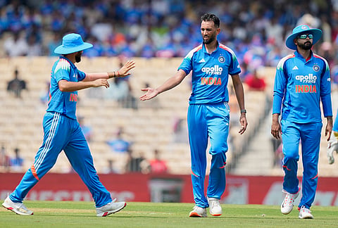 India's Prasidh Krishna, center, celebrates with teammates the wicket of Afghanistan's Rahmat Shah during the third ODI cricket match between Afghanistan and India in Chennai.