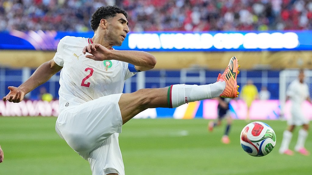 Morocco's Achraf Hakimi clears the ball during the World Cup Group C soccer match between Scotland and Morocco in Foxborough. - AP Photo