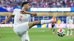 Morocco's Achraf Hakimi clears the ball during the World Cup Group C soccer match between Scotland and Morocco in Foxborough. - AP Photo