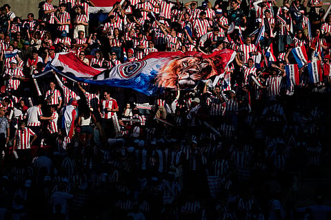 Paraguay fans cheer for their team before the start of the World Cup Group D soccer match between Turkey and Paraguay in Santa Clara, Calif., near San Francisco, Friday, June 19, 2026