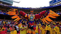 AP Photo/Charlie Riedel : Ecuadorian fans wait for the beginning of the World Cup Group E soccer match between Ecuador and Curacao in Kansas City.