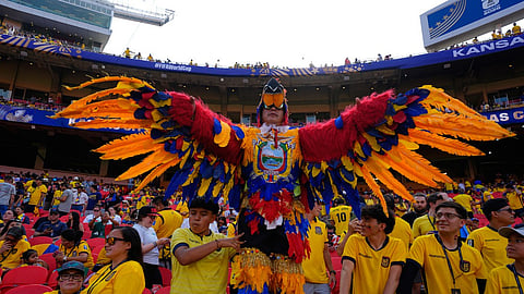 Ecuadorian fans wait for the beginning of the World Cup Group E soccer match between Ecuador and Curacao in Kansas City.
