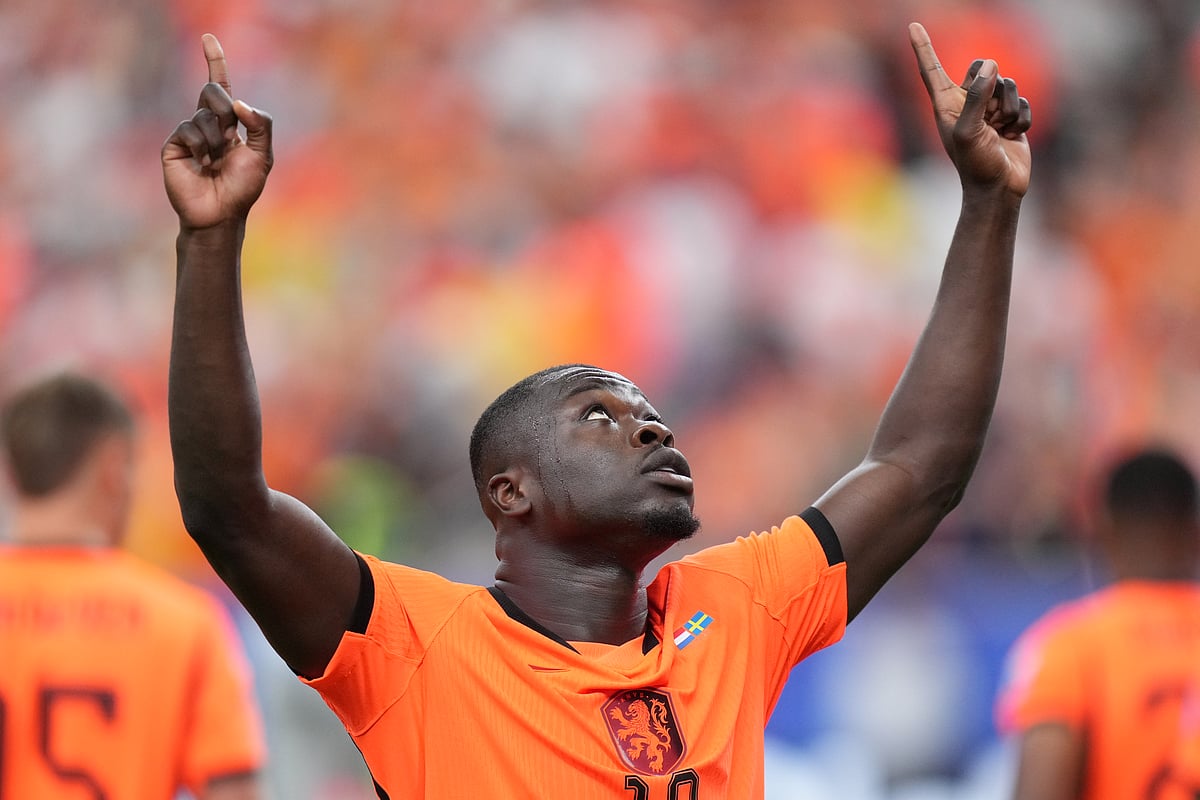 Netherlands' Brian Brobbey celebrates scoring his side's opening goal against Sweden during a World Cup Group F soccer match in Houston - Eric Gay/AP