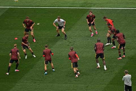Belgian layers warm up for the World Cup Group G soccer match between Belgium and Iran in Inglewood, Calif.,