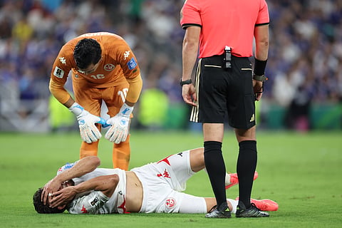 Tunisia goalkeeper Aymen Dahmen (16) checks on teammate Tunisia's Omar Rekik (4) during the World Cup Group F soccer match between Tunisia and Japan in Guadalupe, near Monterrey, Mexico, Saturday, June 20, 2026.