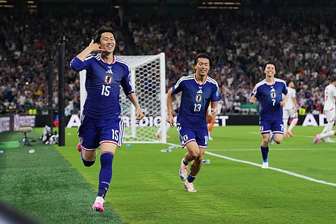 Japan's Daichi Kamada (15) celebrates scoring his side's first goal against Tunisia during the World Cup Group F soccer match in Guadalupe, near Monterrey, Mexico, Saturday, June 20, 2026.