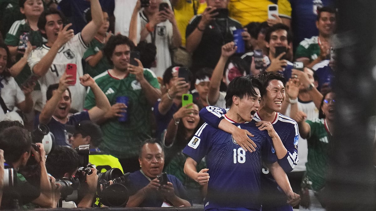 Japan's Ayase Ueda (18) celebrates scoring his side's second goal against Tunisia during the World Cup Group F soccer match in Guadalupe, near Monterrey, Mexico, Saturday, June 20, 2026. - (AP Photo/Matias Delacroix)