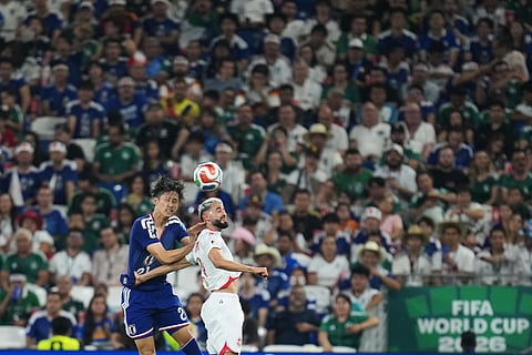 Japan's Hiroki Ito, left, and Tunisia's Elias Saad go for a header during the World Cup Group F soccer match in Guadalupe, near Monterrey, Mexico, Saturday, June 20, 2026.