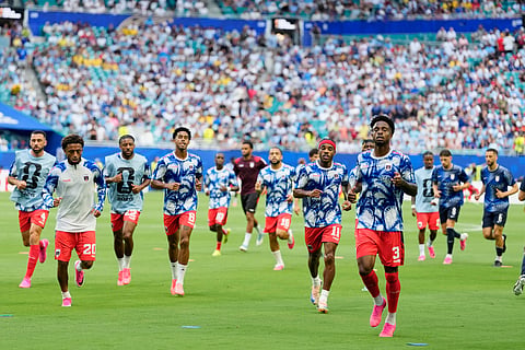 Cape Verde players warm up ahead of the World Cup Group H soccer match between Uruguay and Cape Verde in Miami Gardens