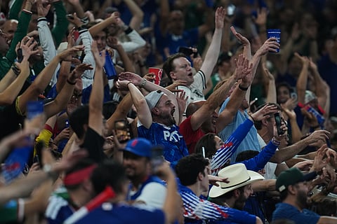 Fans react during the World Cup Group F soccer match between Tunisia and Japan in Guadalupe, near Monterrey, Mexico, Saturday, June 20, 2026.