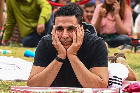 Actor Akshay Kumar participates in a yoga session on the occasion of the International Day of Yoga, in New Delhi.