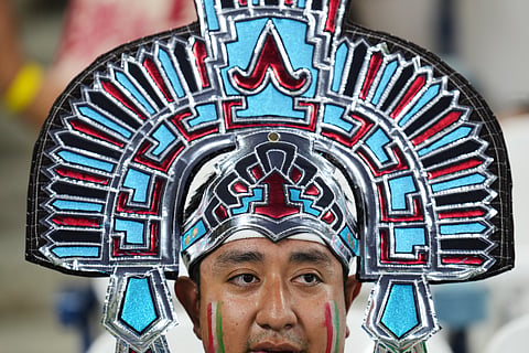 A fan waits for the start of the World Cup Group F soccer match between Tunisia and Japan in Guadalupe, near Monterrey, Mexico, Saturday, June 20, 2026.