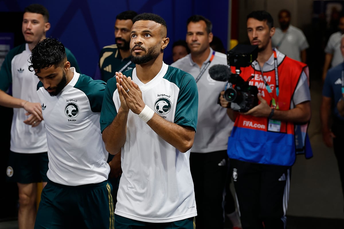 Saudi Arabia team comes out for warm-up, prior to the World Cup Group H soccer match between Spain and Saudi Arabia in Atlanta, - AP/Erik S.Lesser