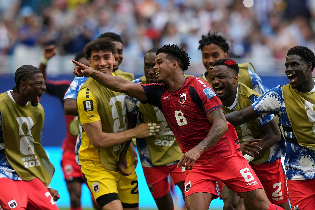 Cape Verdes Kevin Pina, right, celebrates with teammates after scoring the opening goal during the World Cup Group H soccer