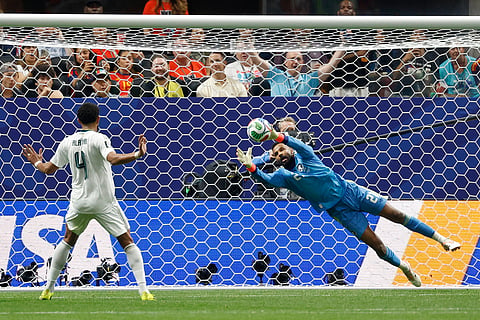 Saudi Arabia goalkeeper Mohammed Alowais goes for the ball during the World Cup Group H soccer match between Spain and Saudi Arabia in Atlanta, Sunday,