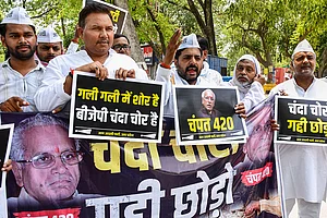 | Photo: PTI : Aam Aadmi Party (AAP) workers hold placards and raise slogans during a protest against Shri Ram Janmabhoomi Teerth Kshetra General Secretary Champat Rai over alleged irregularities in Ram Temple donations, in Prayagraj, Uttar Pradesh,.