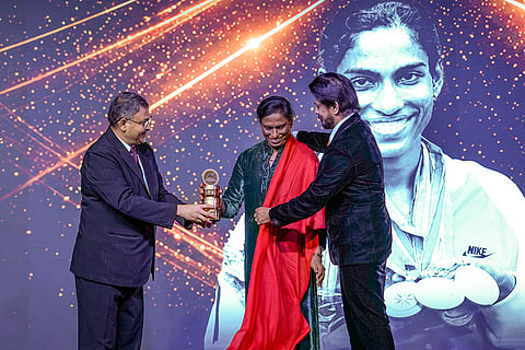 Legendary sprinter and Indian Olympic Association (IOA) President P T Usha, centre, being conferred the 'Lifetime Achievement Award' during the inaugural 'Indian Athletics Awards' ceremony, launched by the Athletics Federation of India (AFI), in New Delhi.