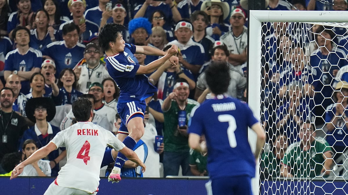 Japan's Ayase Ueda, center, scores their fourth goal with a header against Tunisia during the World Cup Group F soccer match in Guadalupe, near Monterrey, Mexico, Saturday, June 20, 2026. - (AP Photo/Matias Delacroix)