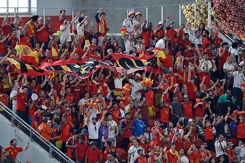 Fans of Spain cheer fo their team during the World Cup Group H soccer match against Saudi Arabia in Atlanta,