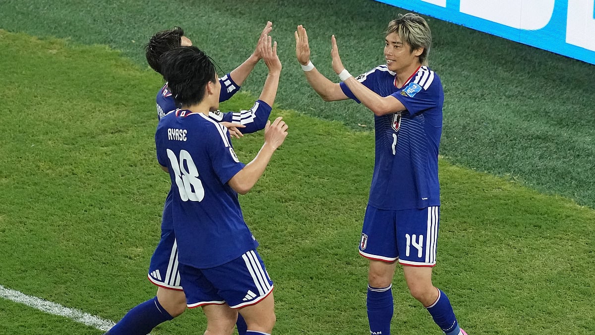 Japan's Junya Ito, right, celebrates scoring his side's third goal against Tunisia during a World Cup Group F soccer match in Guadalupe, near Monterrey, Mexico, Saturday, June 20, 2026. - (AP Photo/Moises Castillo)