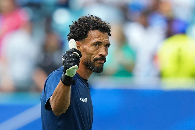 Cape Verde goalkeeper Vozinha waves to fans prior to the World Cup Group H soccer match against Uruguay - AP/Lynne Sladky