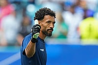 AP/Lynne Sladky : Cape Verde goalkeeper Vozinha waves to fans prior to the World Cup Group H soccer match against Uruguay
