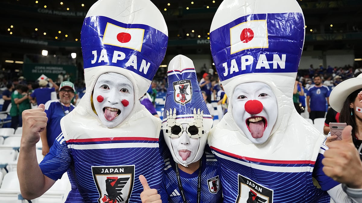 Fans of Japan pose for a picture prior to the World Cup Group F soccer match between Tunisia and Japan in Guadalupe, near Monterrey, Mexico, Saturday, June 20, 2026. - (AP Photo/Matias Delacroix)
