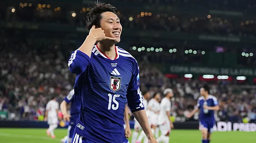 (AP Photo/Matias Delacroix) : Japans Daichi Kamada (15) celebrates scoring his sides first goal against Tunisia during the World Cup Group F soccer match in Guadalupe, near Monterrey, Mexico, Saturday, June 20, 2026.