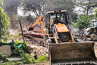 | Photo: PTI : Authorities carry out a demolition drive at the Samajwadi Party office, in Sitapur, Uttar Pradesh.