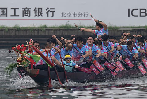 Performers demonstrate their skills ahead of Dragon Boat Races to celebrate the Dragon Boat Festival in Beijing.